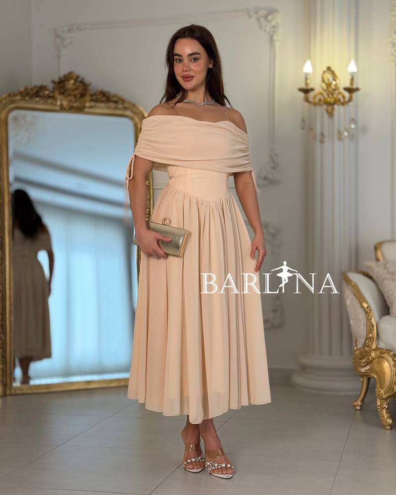 Beige midi dress with lightweight fabric and an elegant cut