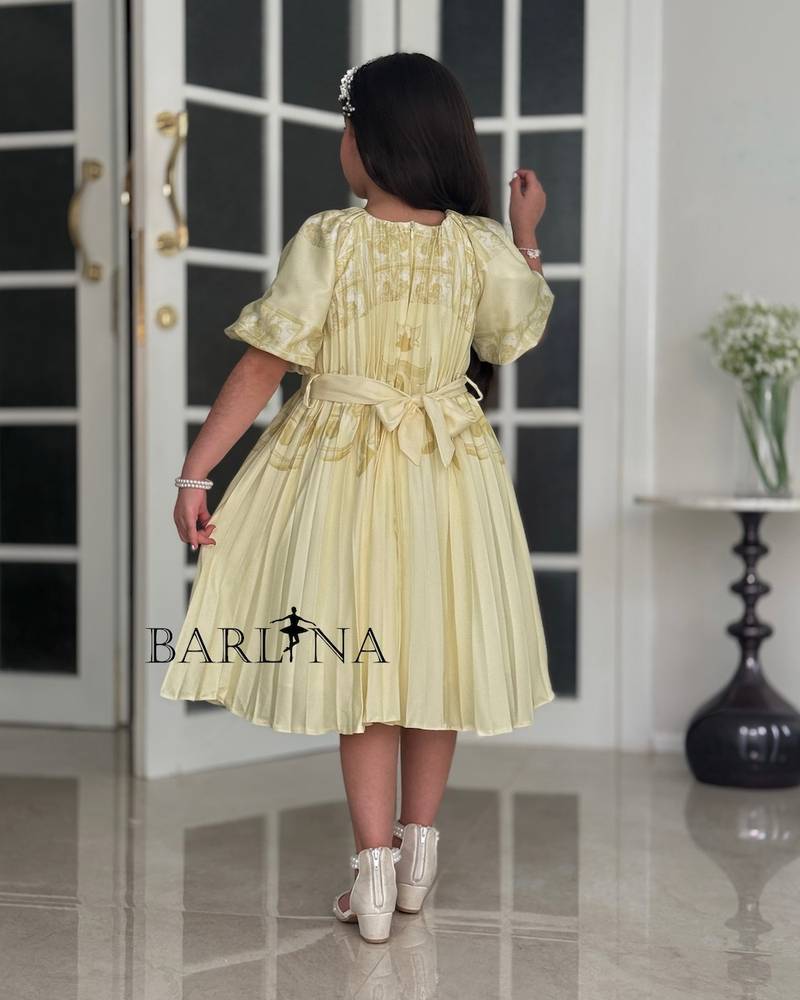 Soft pleated dress for girls with a wide cut