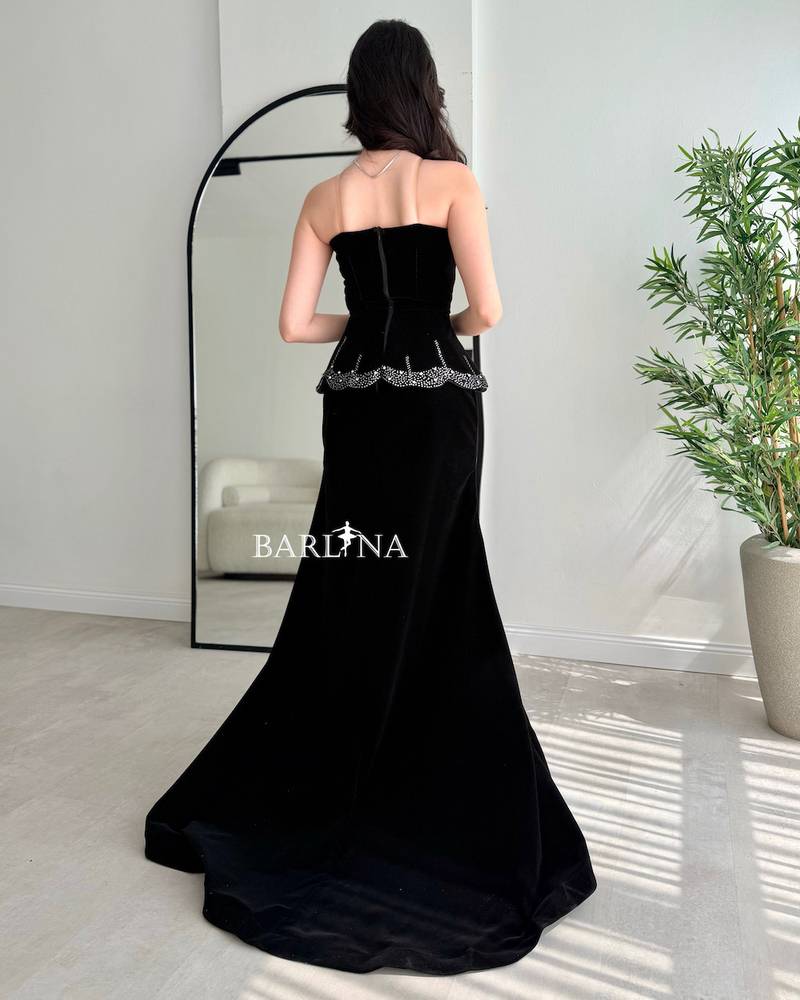 Black velvet dress with crystal-studded edges