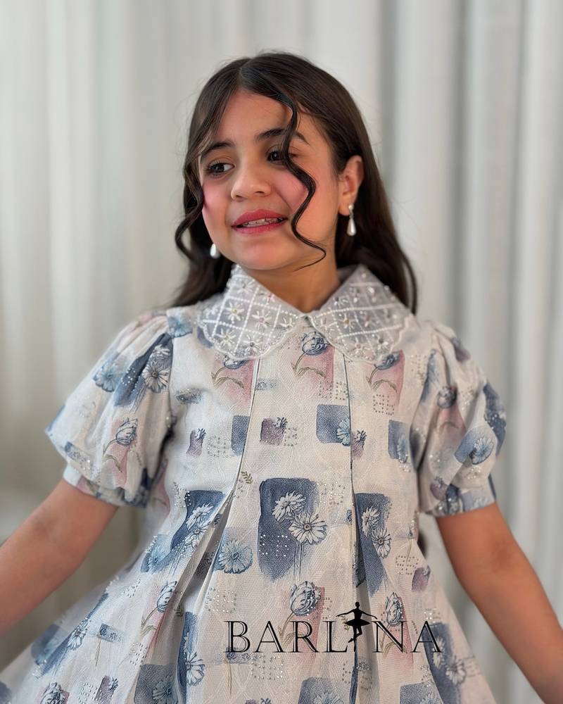 Girls' dress decorated with printed patterns