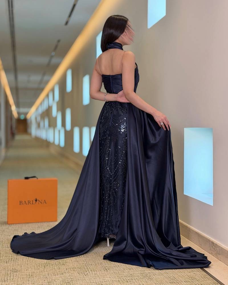 Navy blue evening dress with a wrap-around neckline