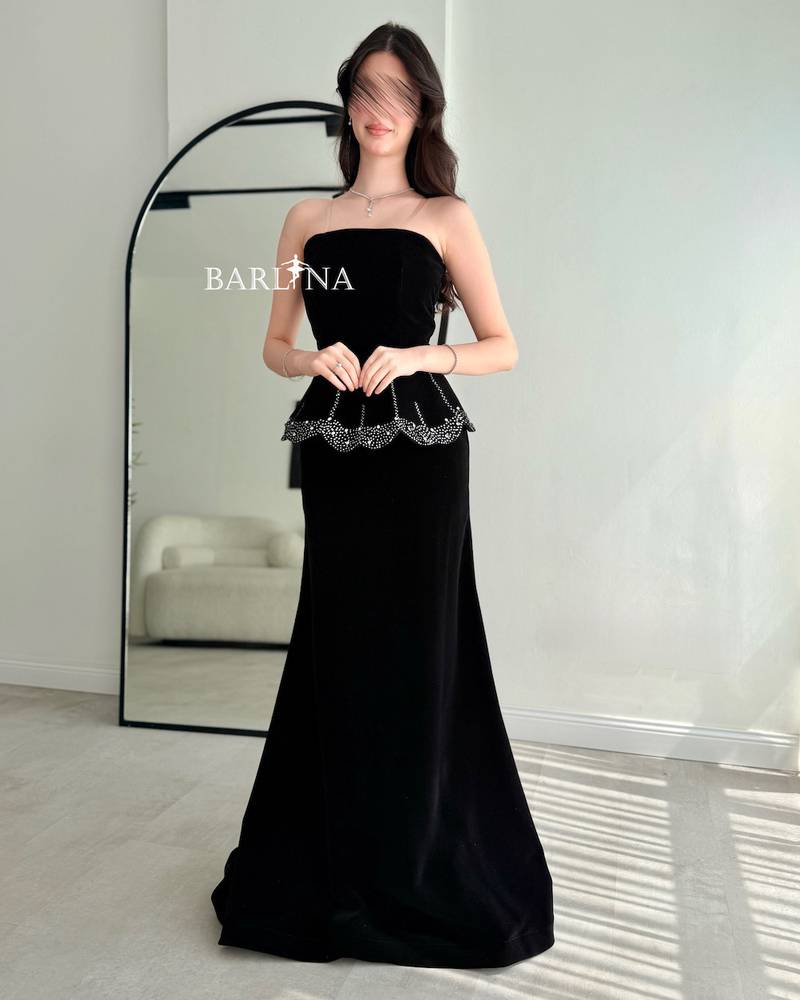 Black velvet dress with crystal-studded edges
