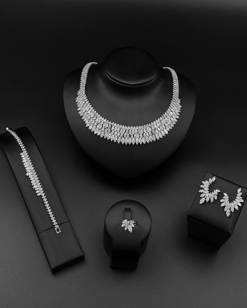 Wide design accessory set studded with stones