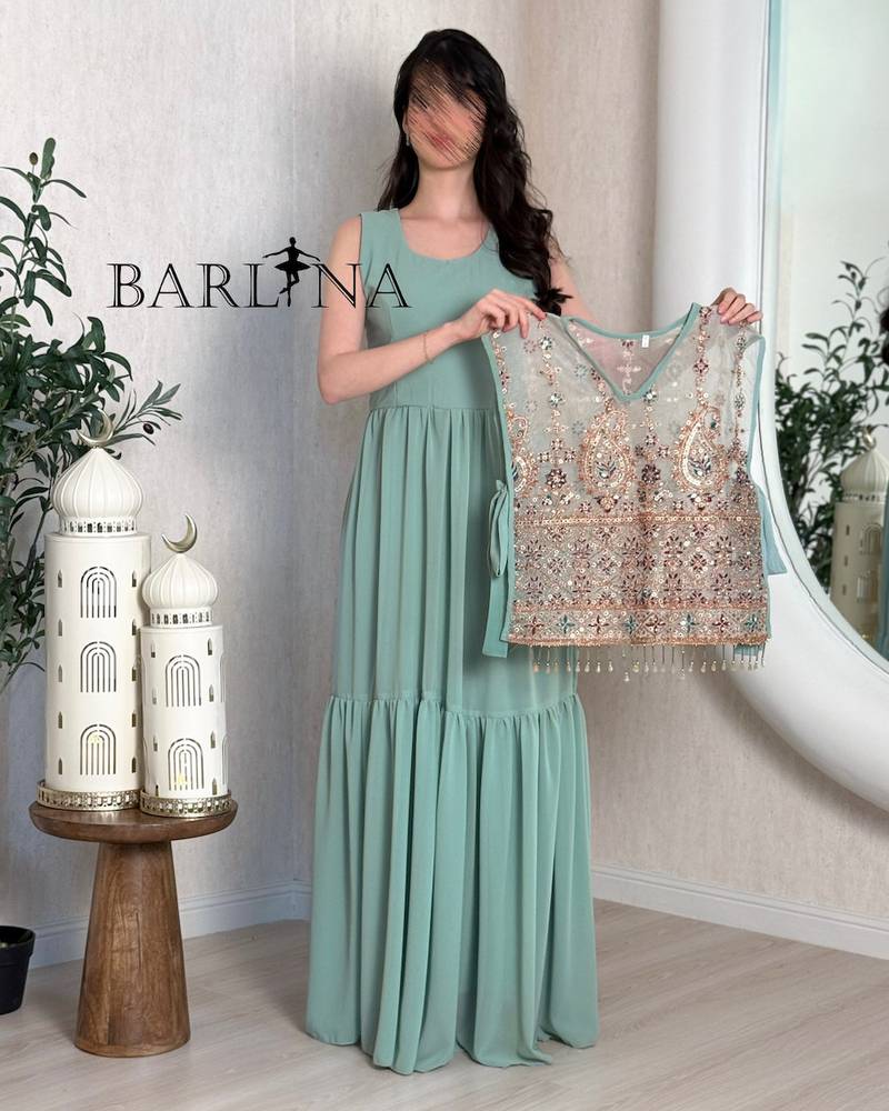 A luxurious jalabiya with an embroidered layer and a traditional touch.