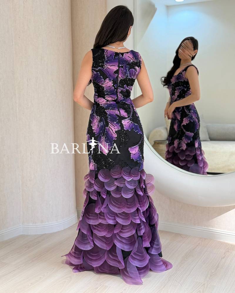 Black floral dress with a tiered train