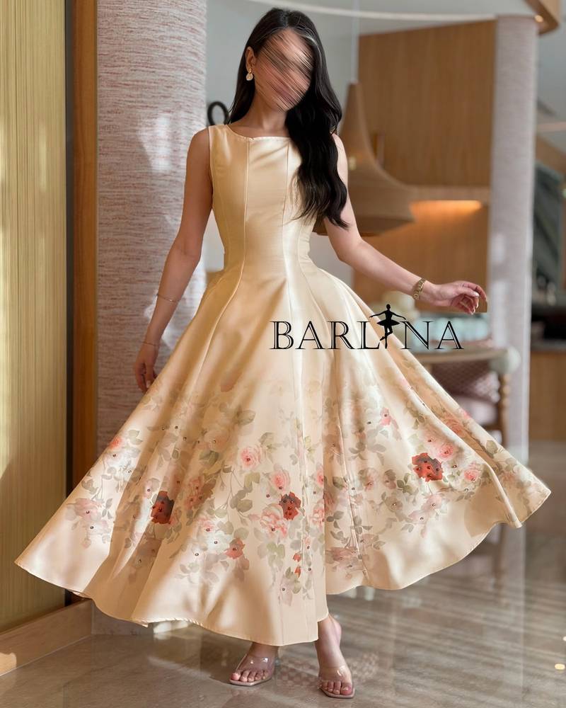 Beige dress adorned with delicate floral prints
