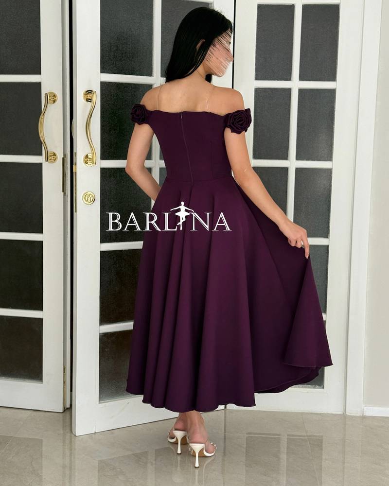 A soft purple dress decorated with roses