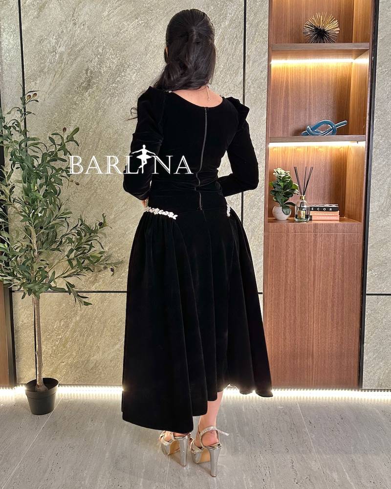 Black velvet dress with crystal embellishment