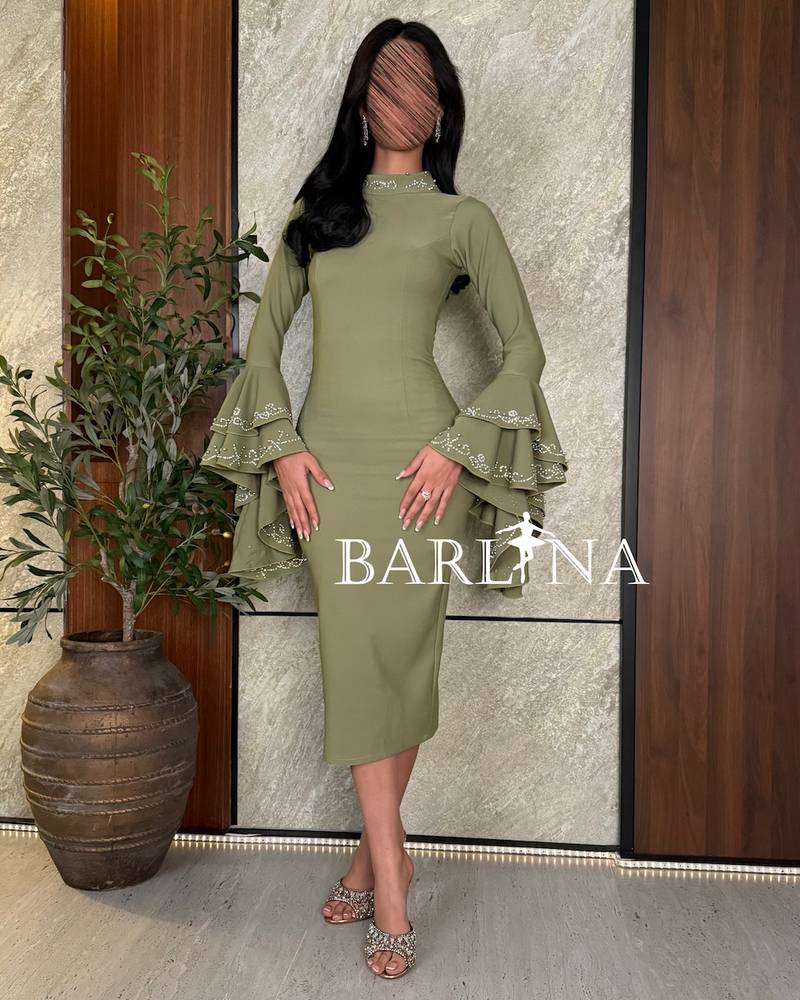 Olive green dress with wide sleeves and sequins