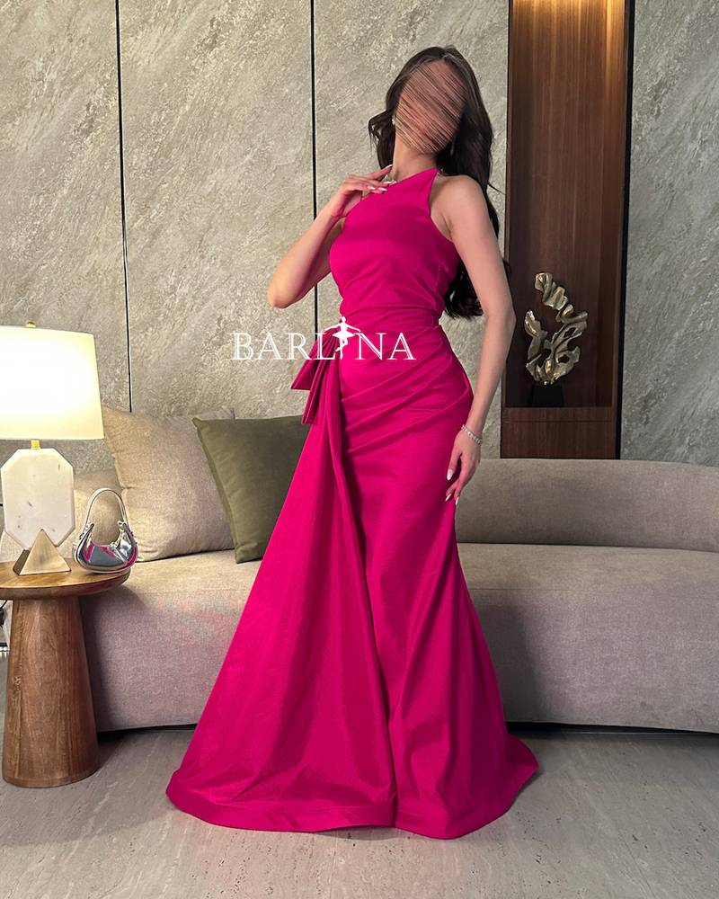 Sleeveless fuchsia evening dress with side train