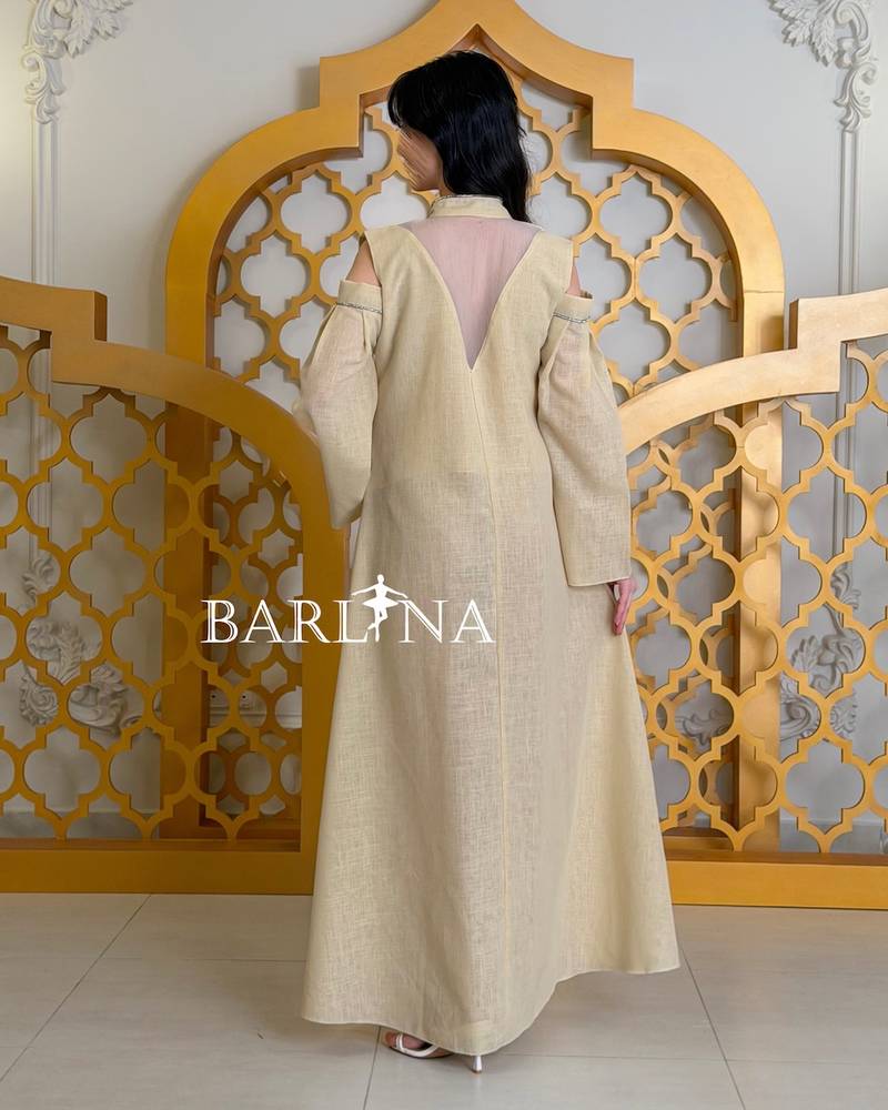 Beige jalabiya decorated with raised flowers