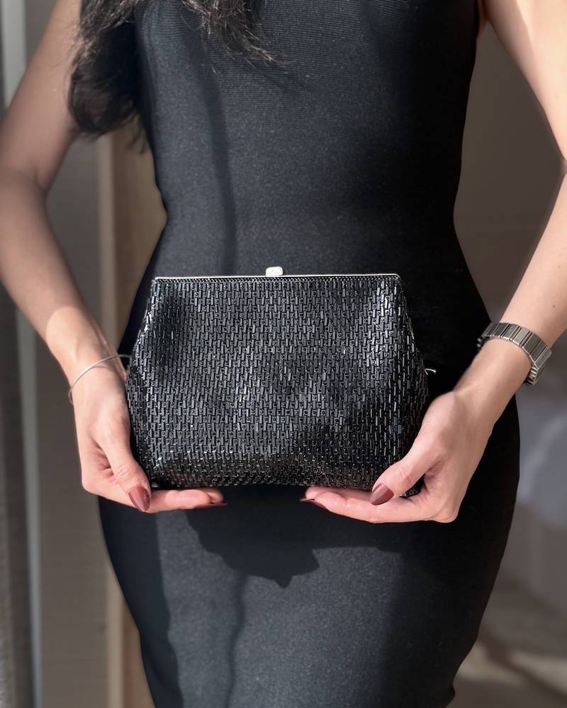 Handbag with elegant mesh details
