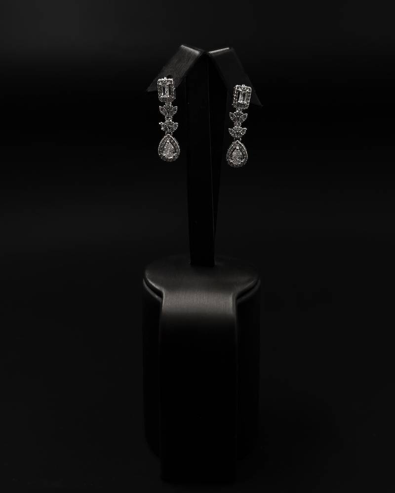 Silver drop earrings with a jeweled finish