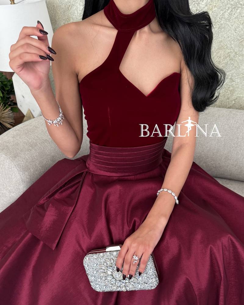 Luxury burgundy dress with a distinctive neckline