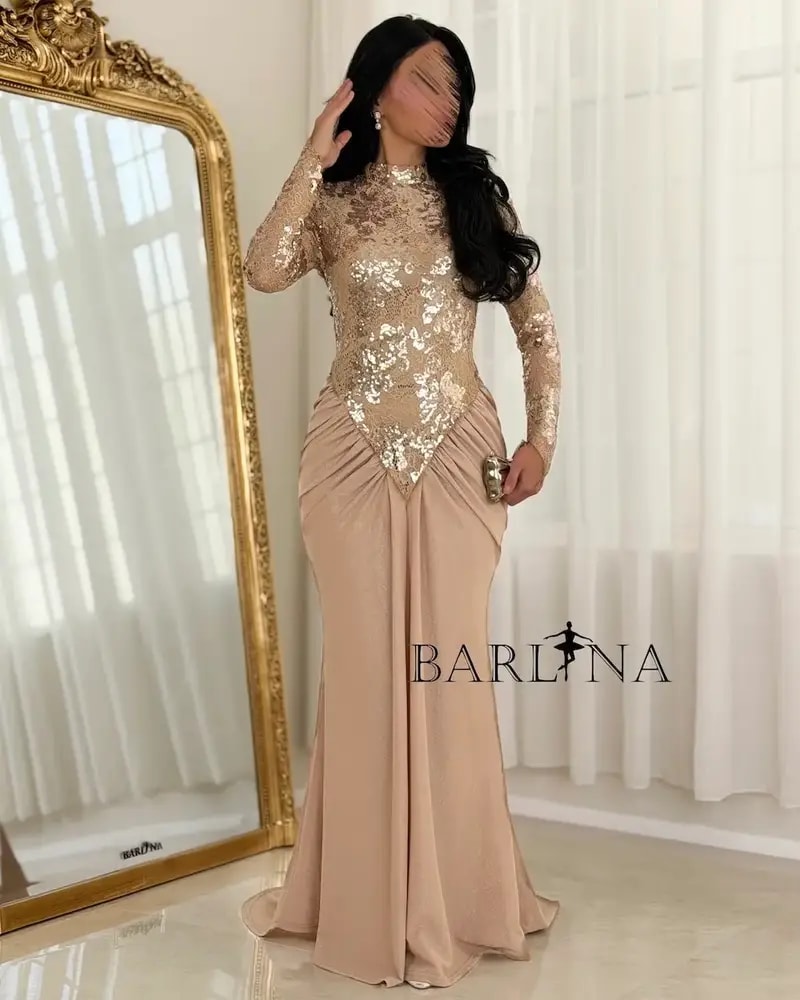 Evening dress adorned with embroidery and shimmering sequins
