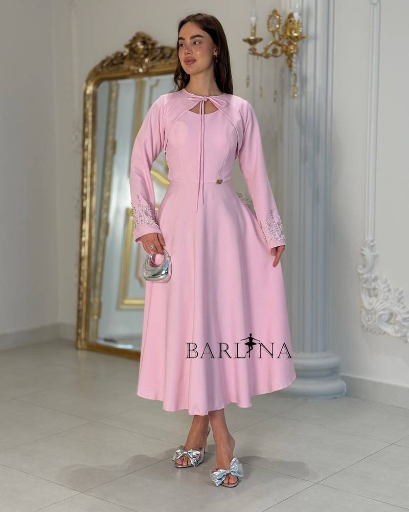 Pink dress with a jacket decorated with crystals and pearls