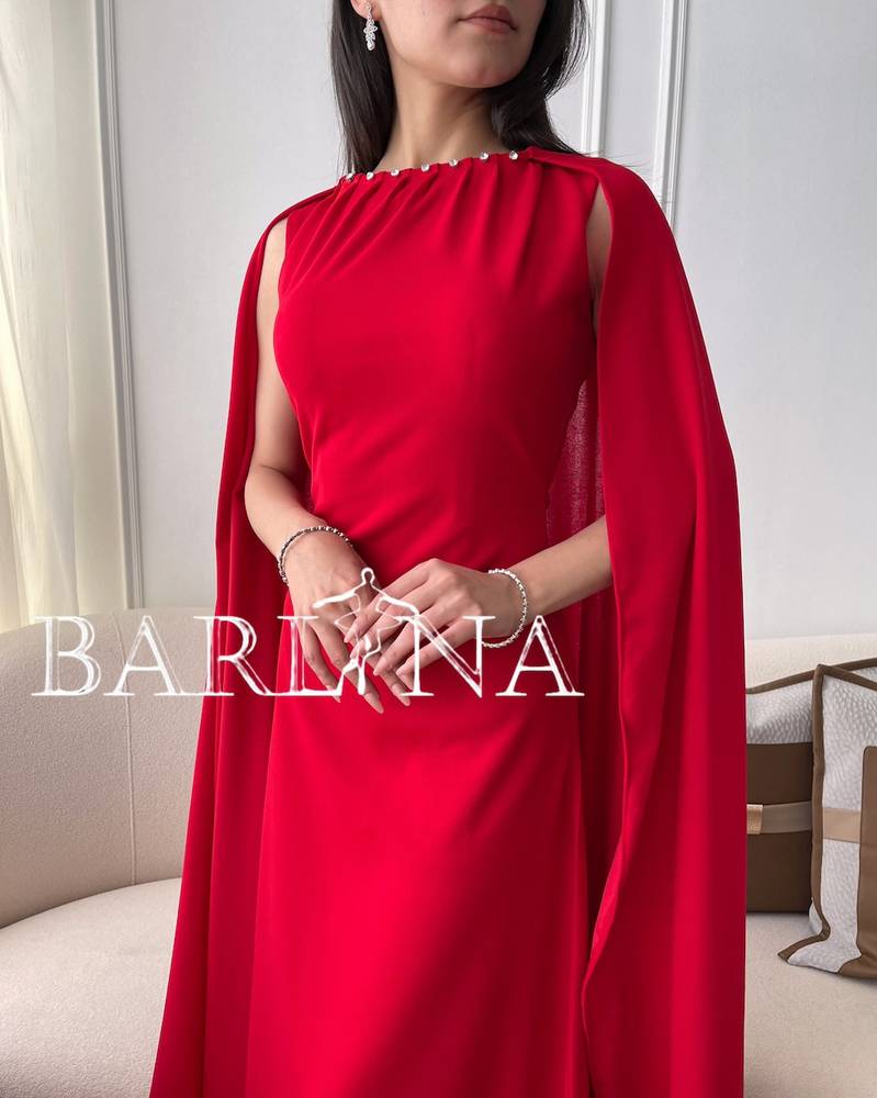 Long red evening dress with cape and crystals