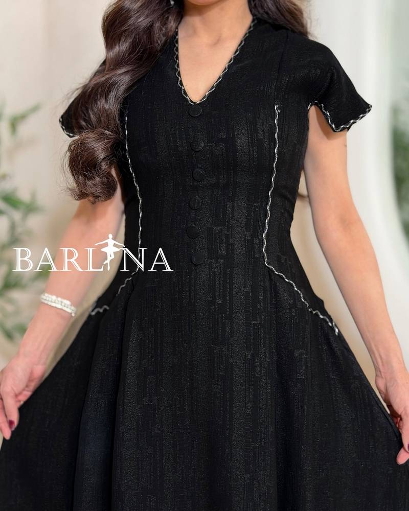 Black dress with front buttons and zigzag embroidery