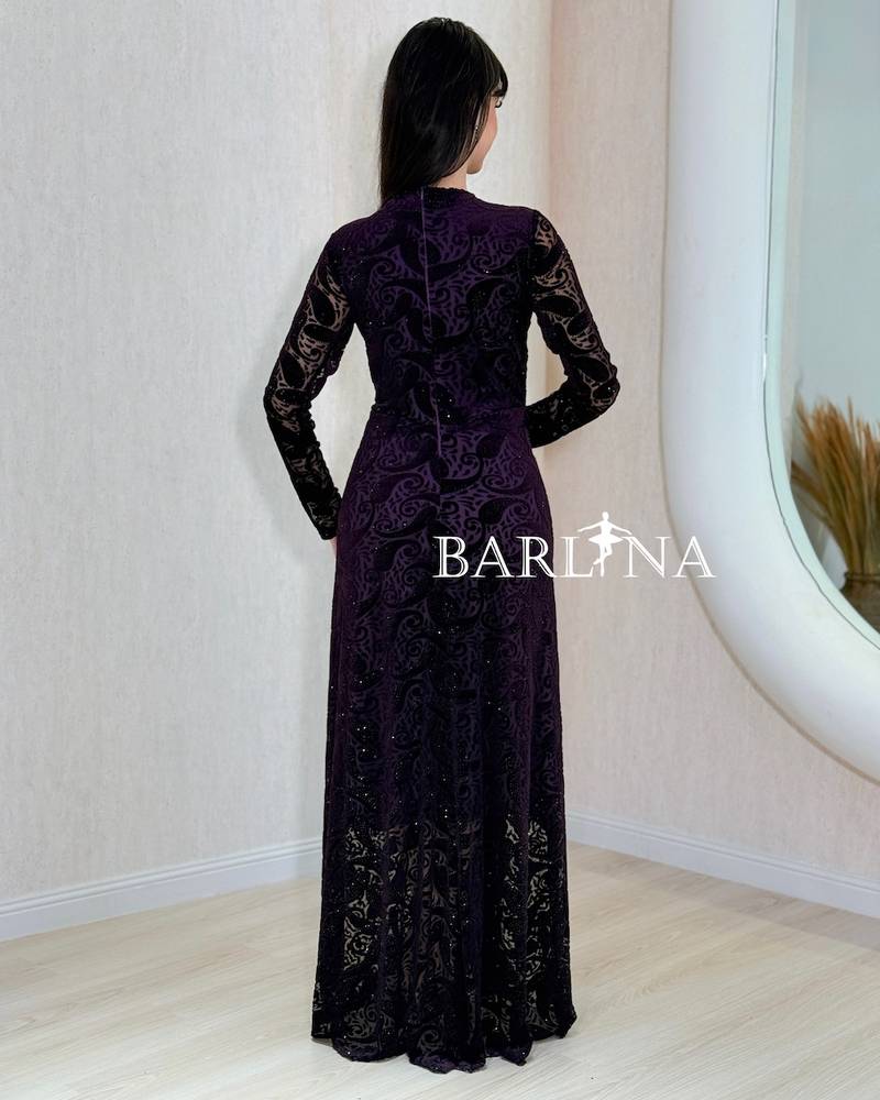 Dark purple dress with sheer patterned sleeves