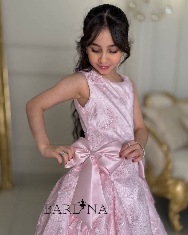 Pink girl's dress with side bow detail