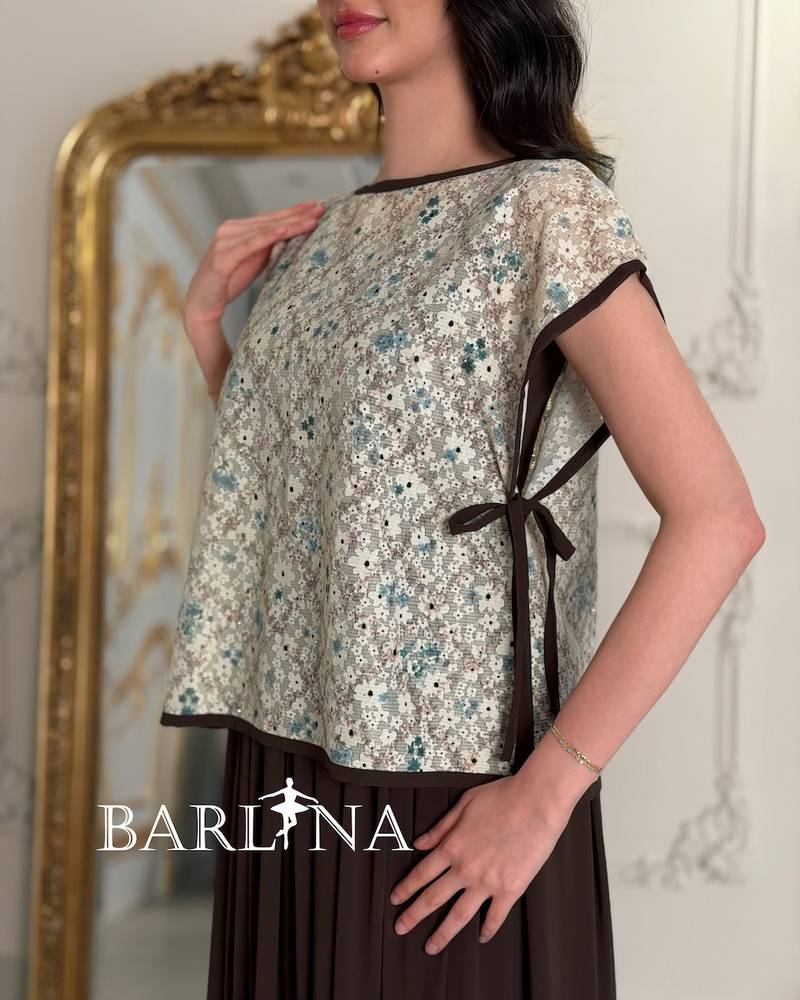 Brown jalabiya with a delicate patterned overlay