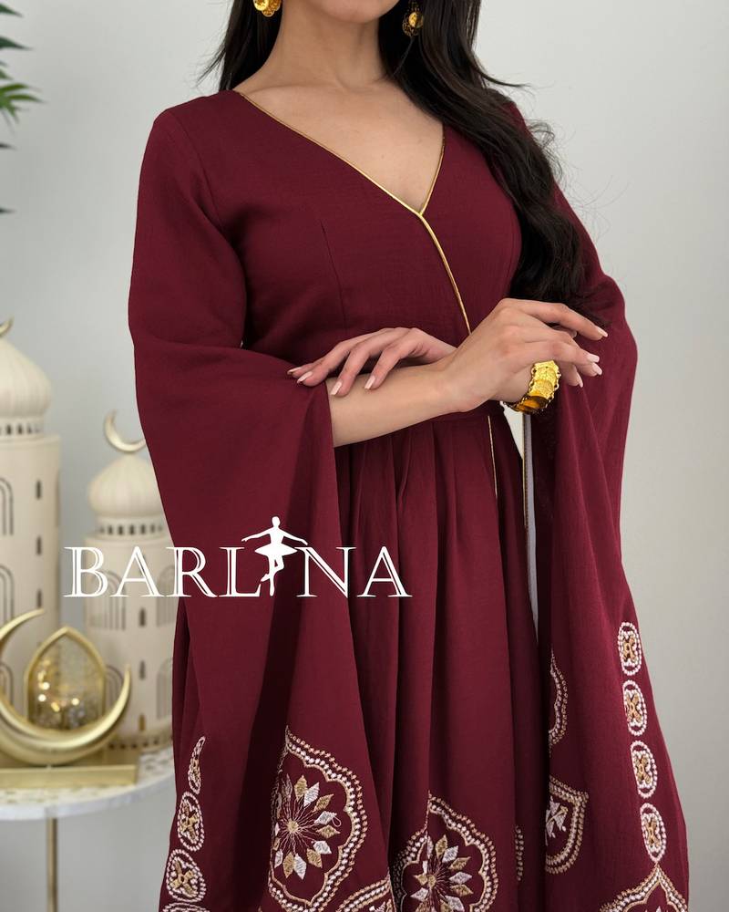 Maroon jalabiya with oriental embroidery and flowing sleeves