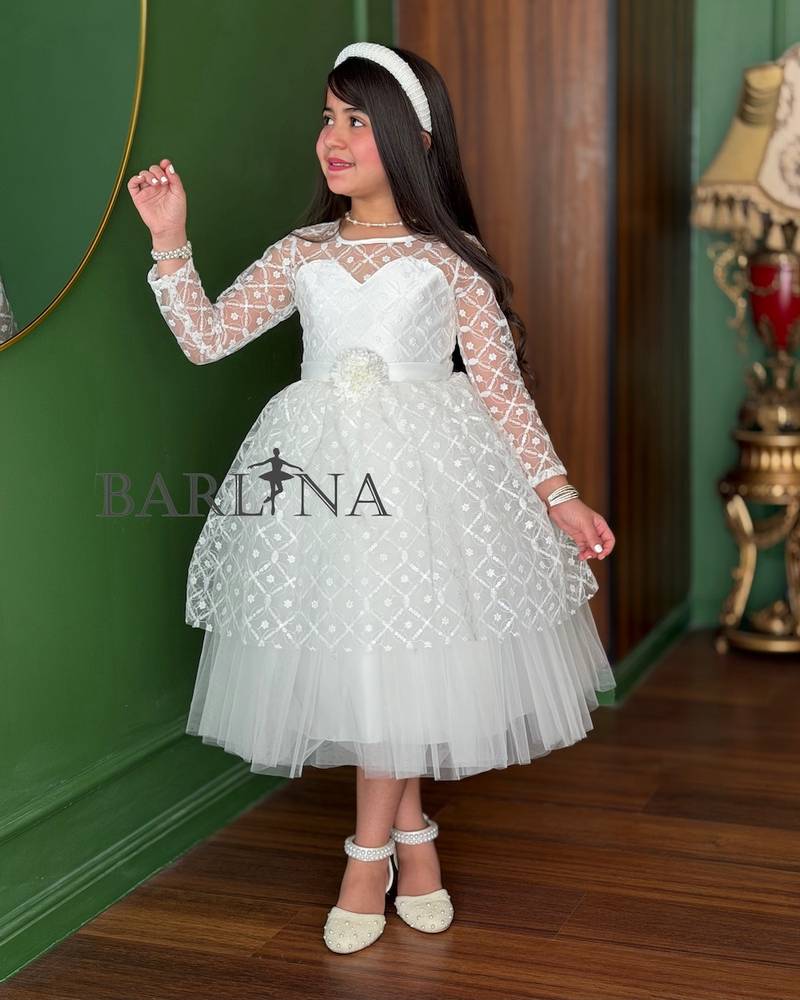 white girl's dress with sheer decorative sleeves