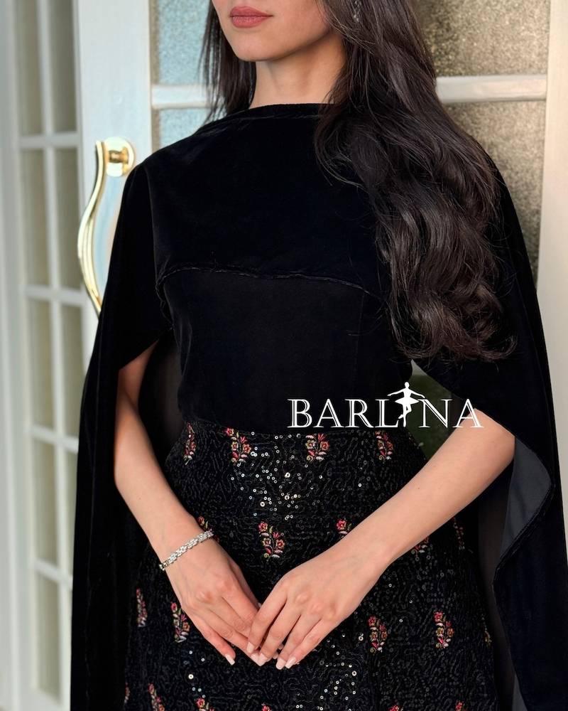 Luxurious black jalabiya with a velvet scarf