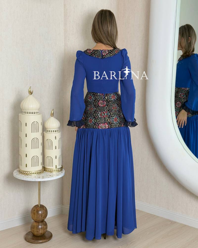 Blue jalabiya with a soft cut and traditional embroidery