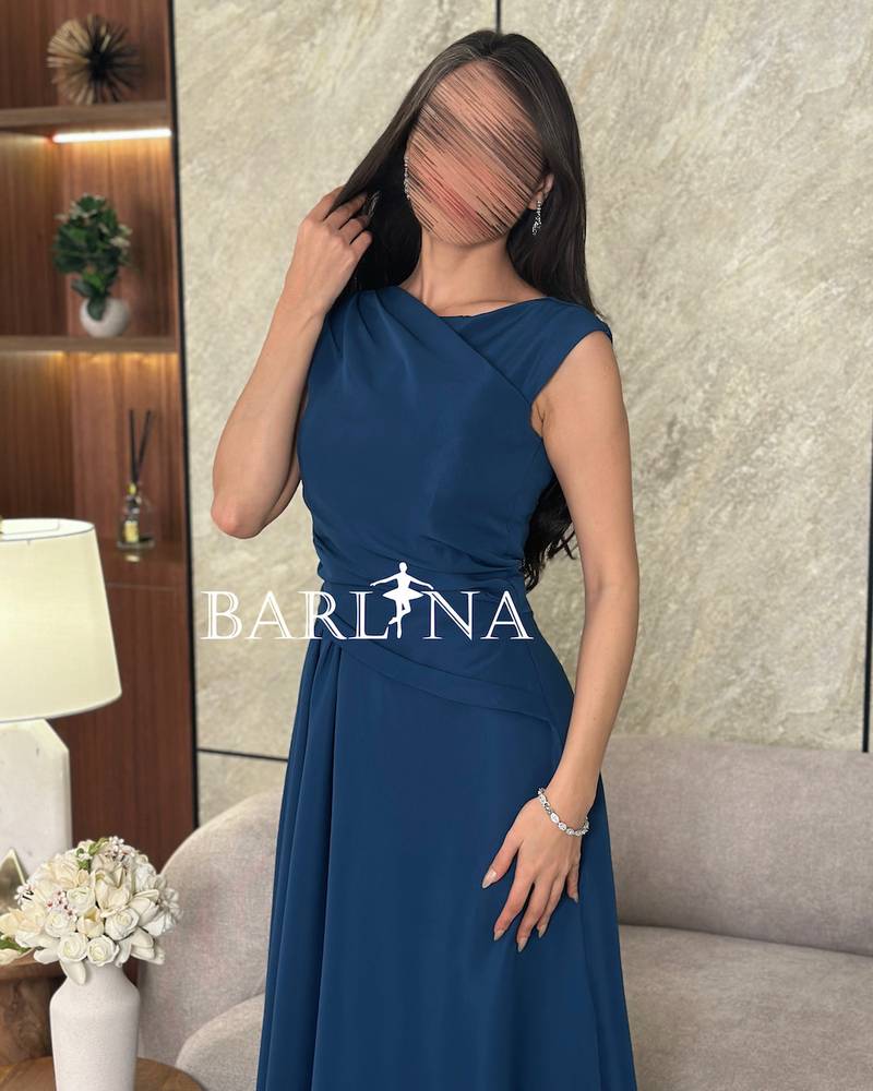 Navy blue dress with ripples at the waist