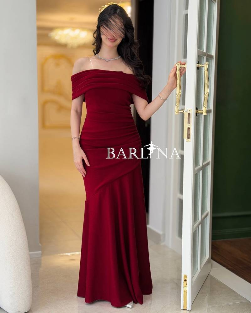 Red draped dress with dropped shoulders