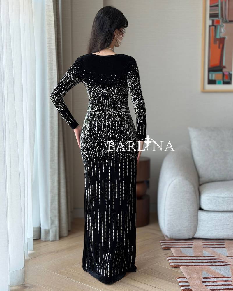 Black velvet dress embroidered with matching crystals