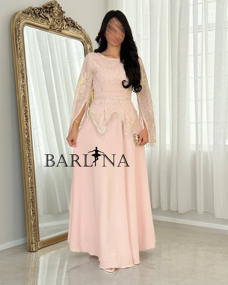 Pink dress with embroidered top and wide sleeves