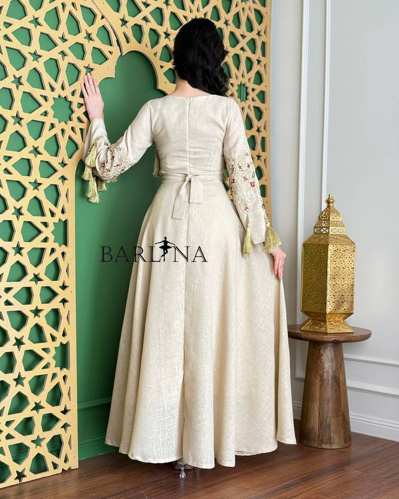 Beige jalabiya embroidered with delicate, fine details