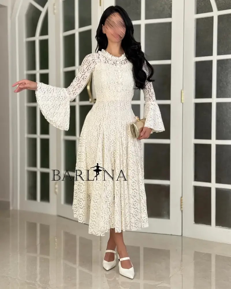 A soft dress adorned with elegant lace patterns