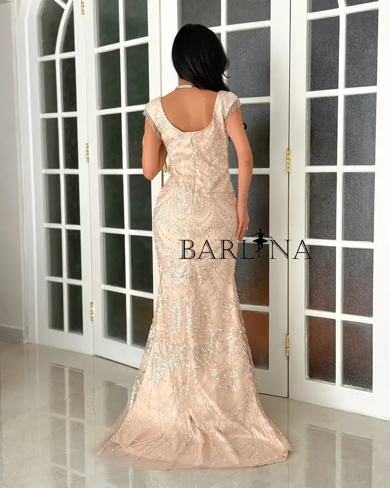 Beige evening dress embroidered with matching sequins
