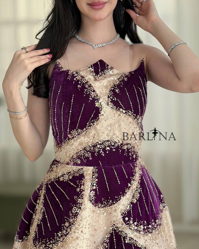 Beige evening dress with shimmering purple embroidery