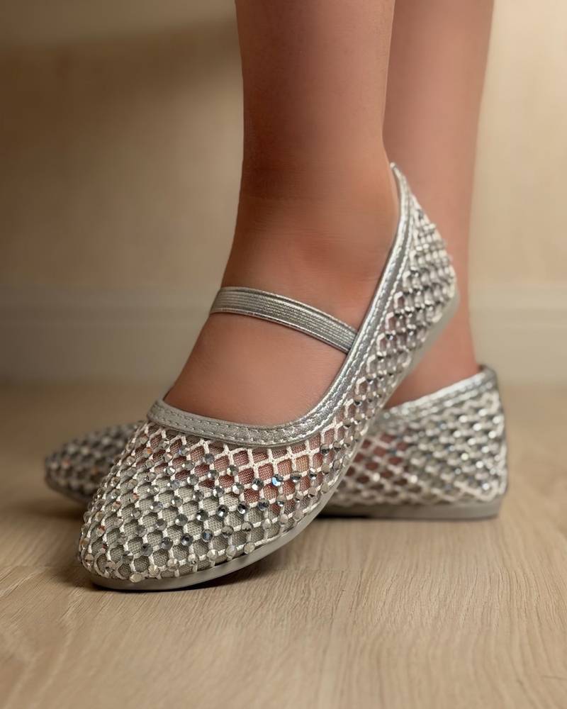 Soft girls' shoes adorned with sparkling crystals