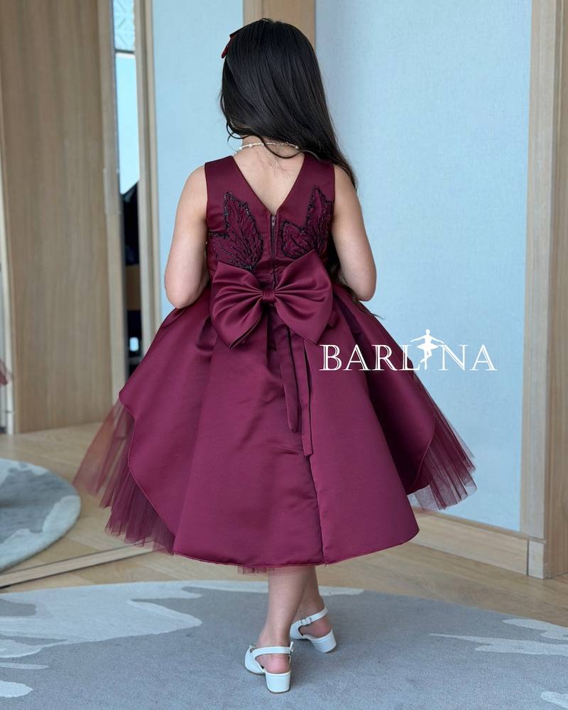 Girls' burgundy dress with a fluffy tulle overlay