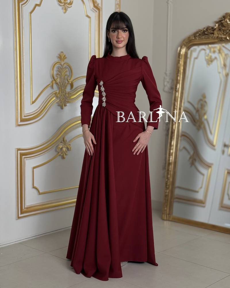 Elegant burgundy dress with delicate crystal detailing