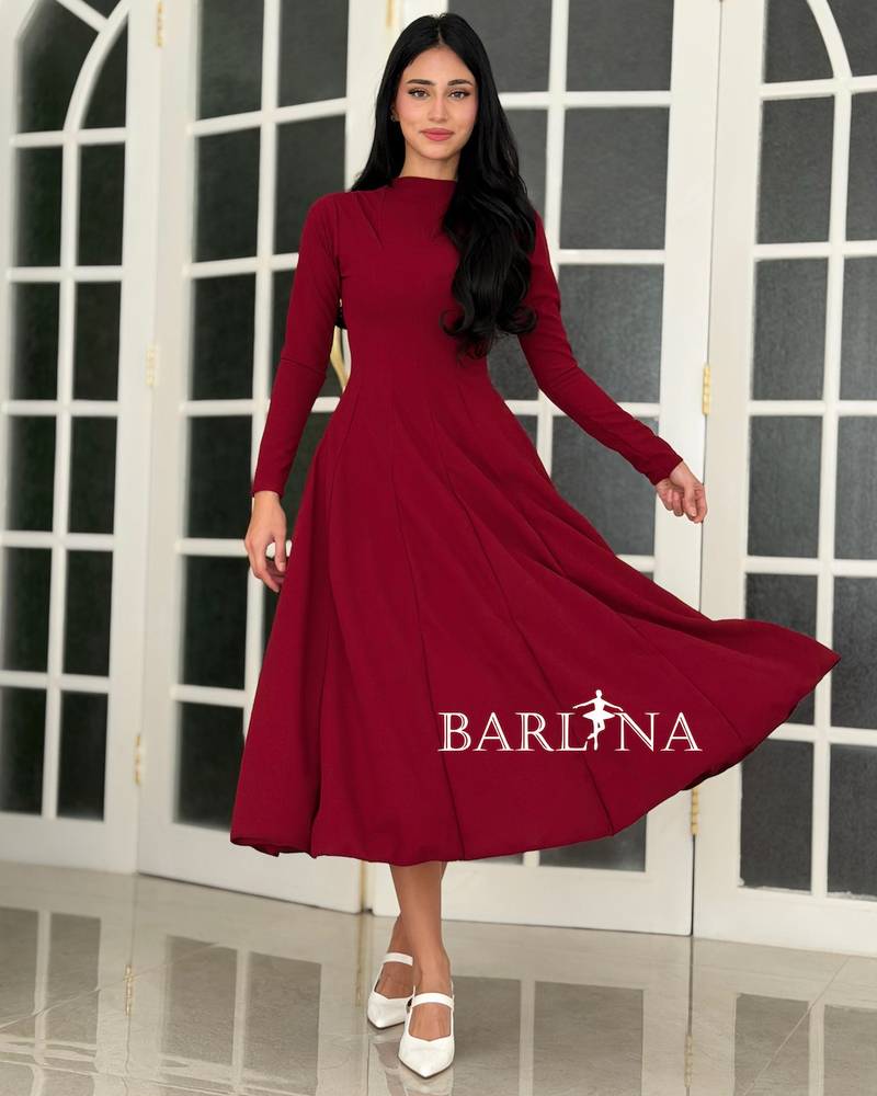 A soft red dress with a sophisticated classic design