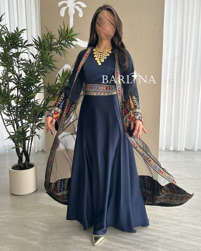 Navy blue jalabiya with colorful traditional embroidery