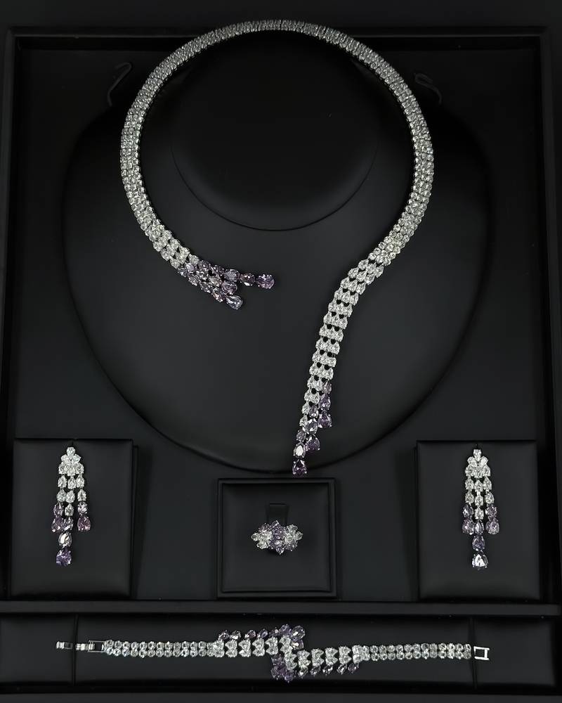 Modern accessory set with an open purple necklace
