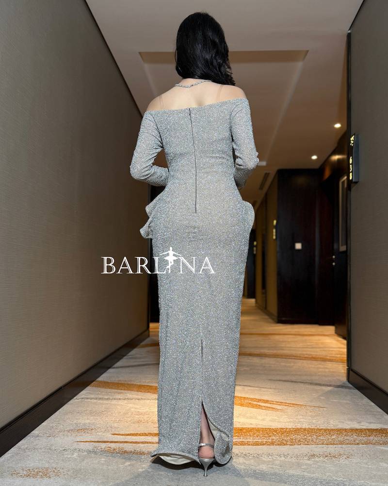 A soft silver dress with elegant side details