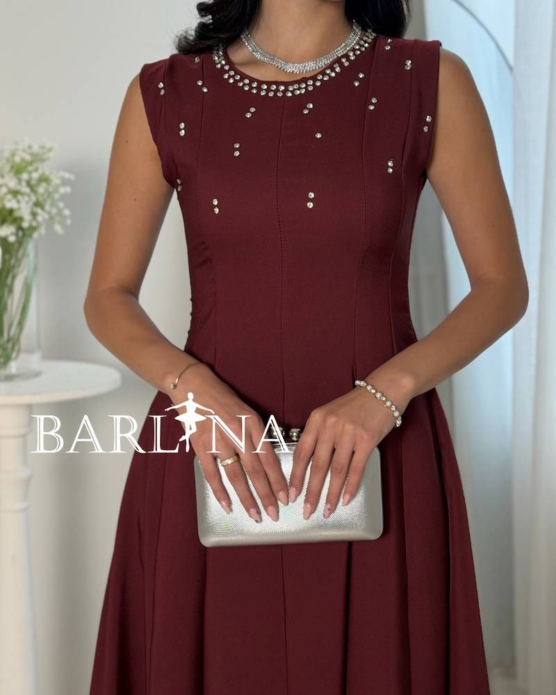 Elegant burgundy dress with a soft flared silhouette