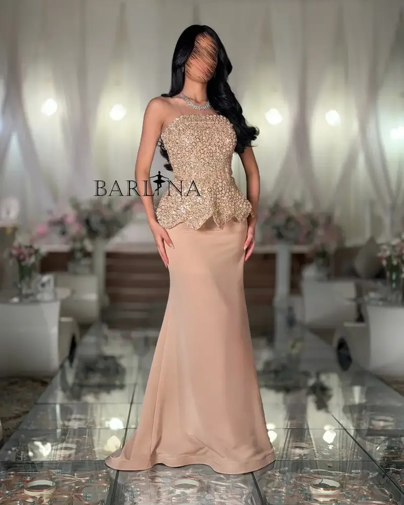 Beige evening dress with an embroidered corset design