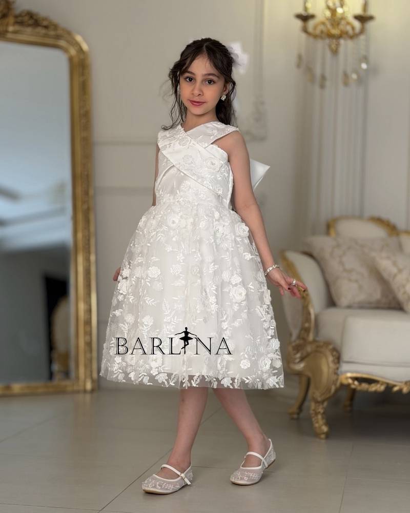Soft white girls' dress with a cross-neck