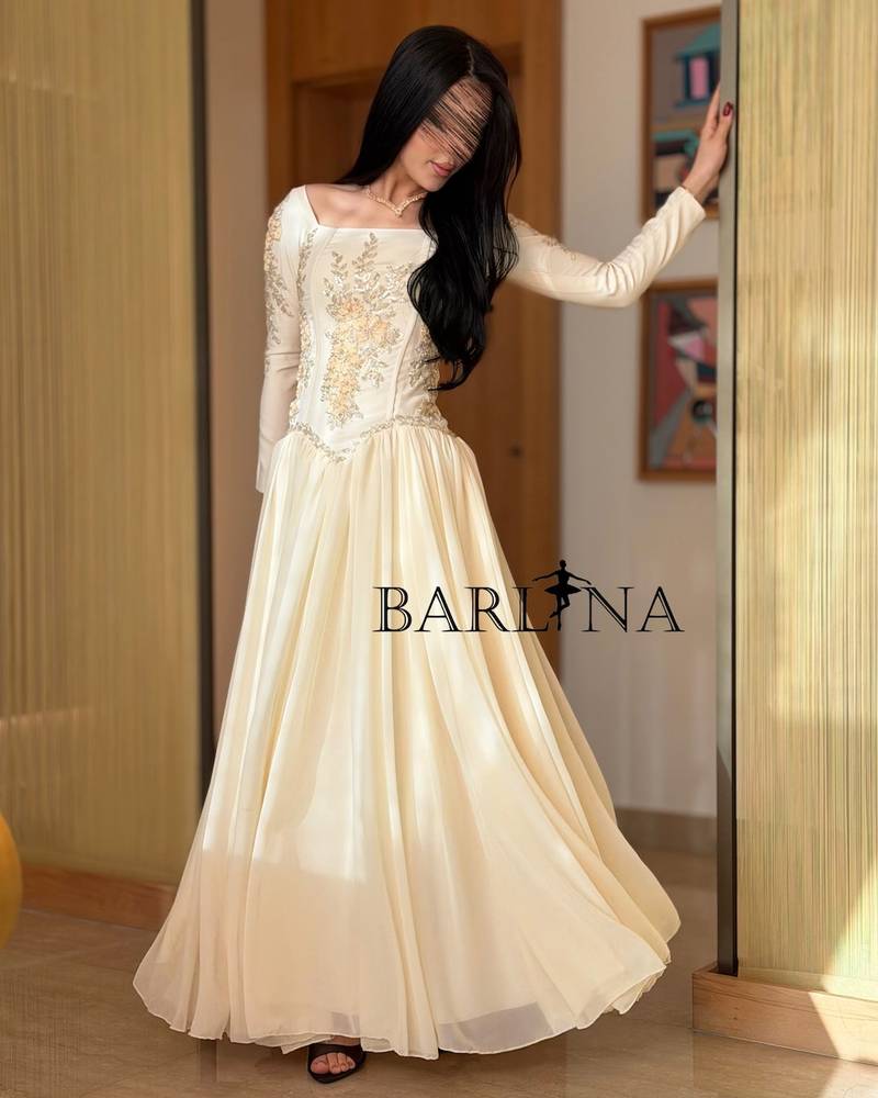 Ivory wide dress with long embroidered sleeves