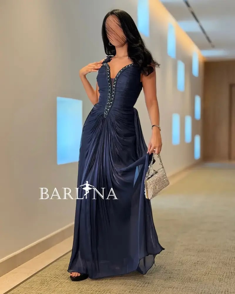 Long navy dress with embroidered details
