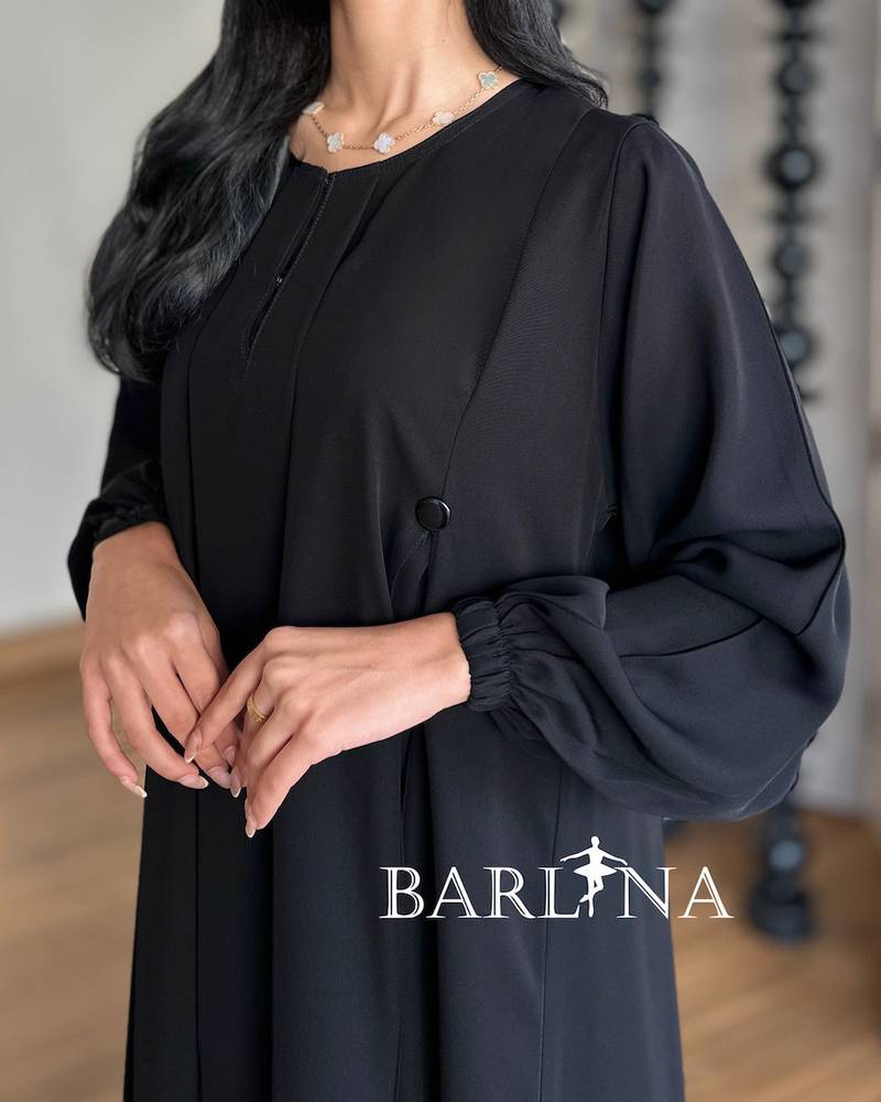 Black abaya with soft lines and side buttons